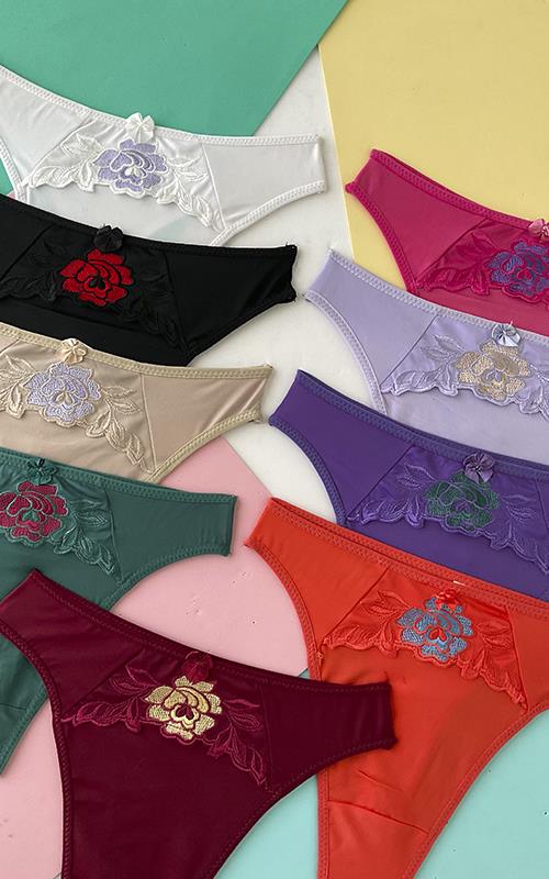 T063 Tanga liso con detalle flor